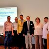 Zogen Zwischenbilanz (v.l.): Dietrich Eckeberg (Diakonie RWL) Helge Hohmann (EKvW), Staatssekretär Andreas Bothe, Vizepräsident Albert Henz, Karin Wieder (Diakonie RWL) und Edgar Born (Ev. Akademie Villigst). Foto: EKvW/Institut für Kirche und Gesellschaft